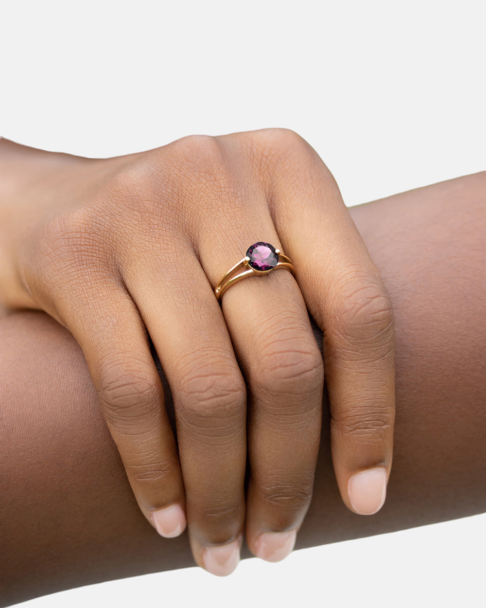 Intention_ring_on_finger_cutout2_grey_Rhodolite_websitesize.jpg