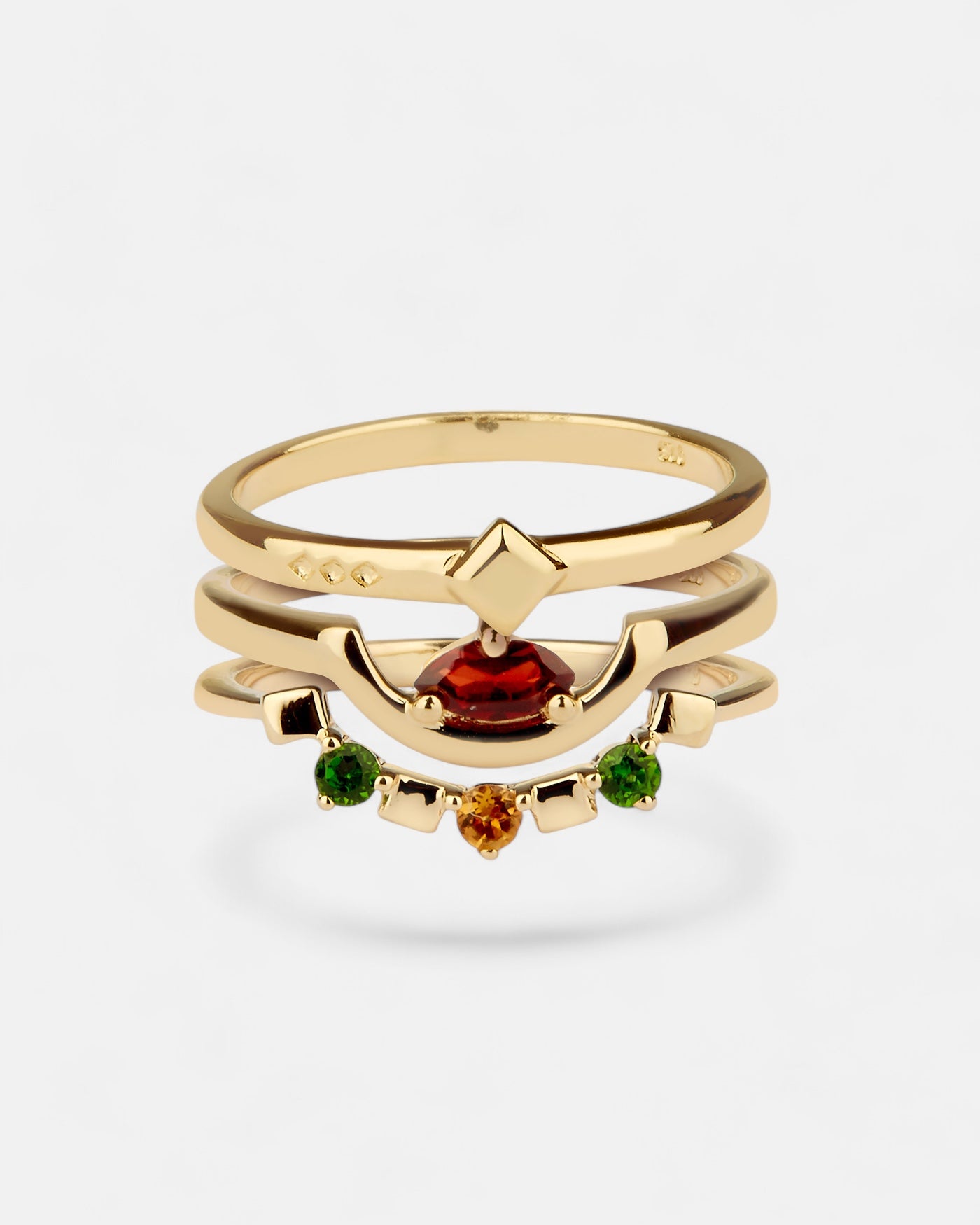 Daring Triad Ring Garnet Gold