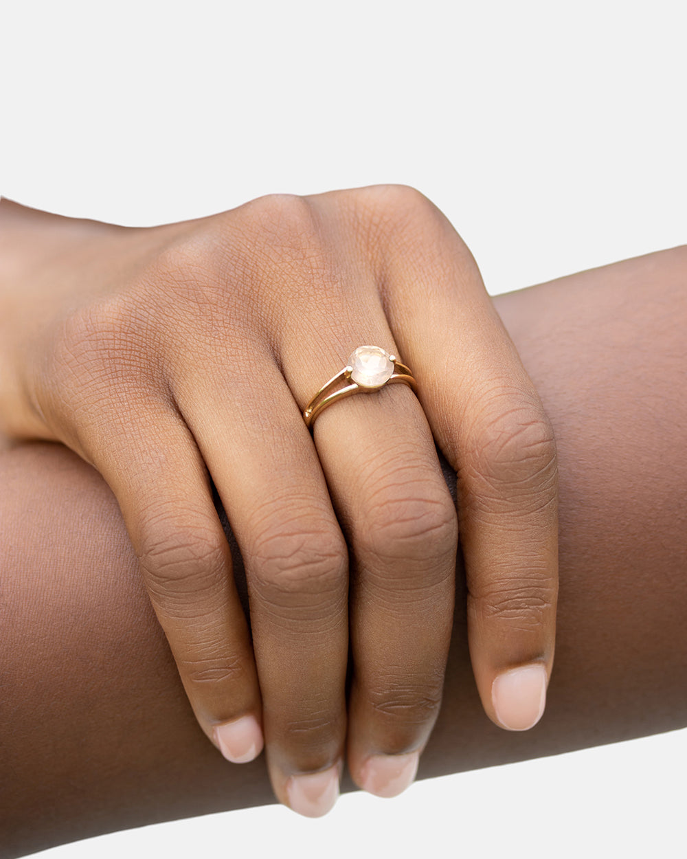 Intention_ring_on_finger_cutout2_grey_Rose_Quartz_websitesize.jpg